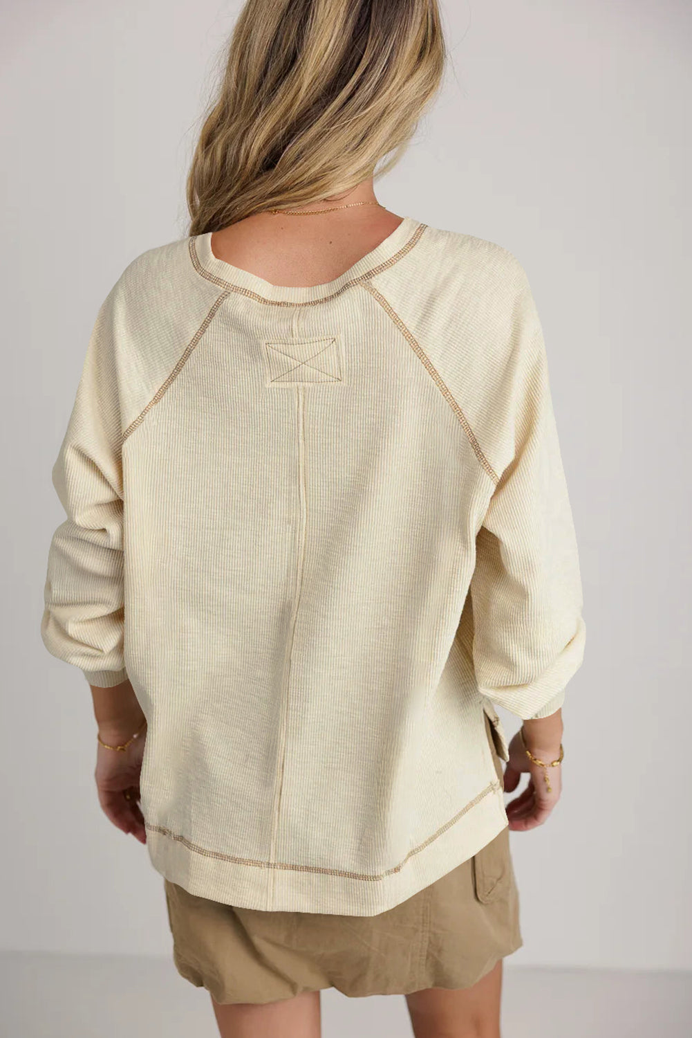 Beige Exposed Seam Textured Knit V Neck Pullover Top